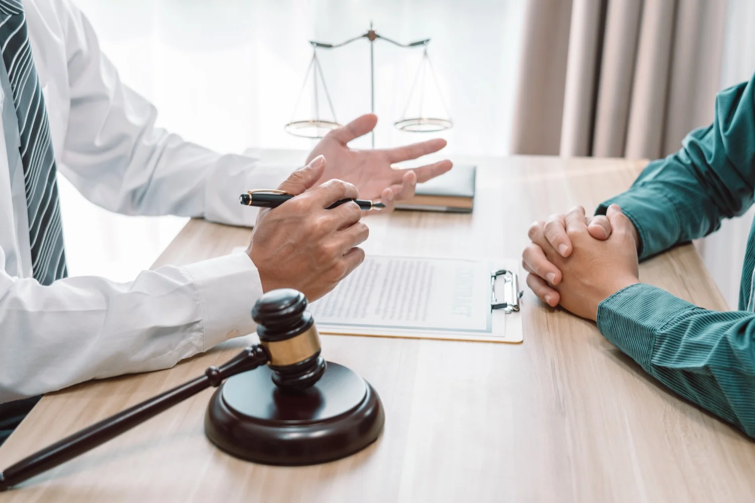 Accident attorney and client meeting