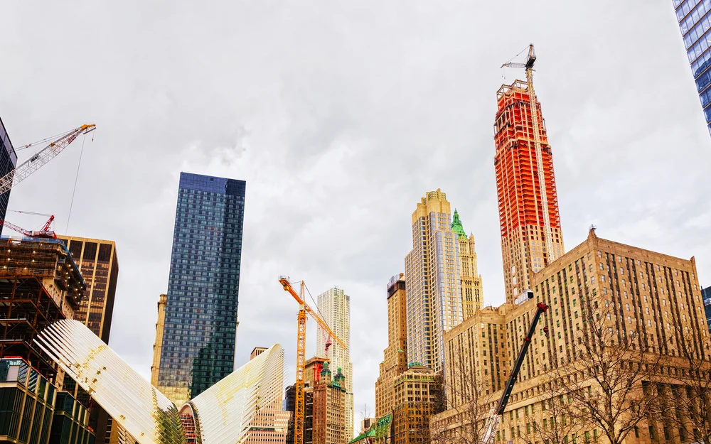 Multiple construction projects in New York City, view of cranes