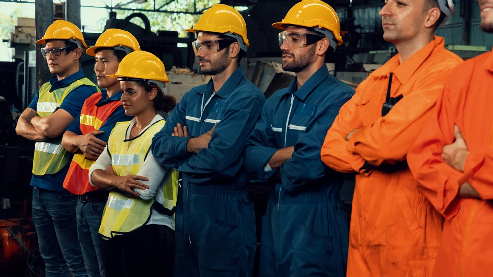 Workers stand together, union concept